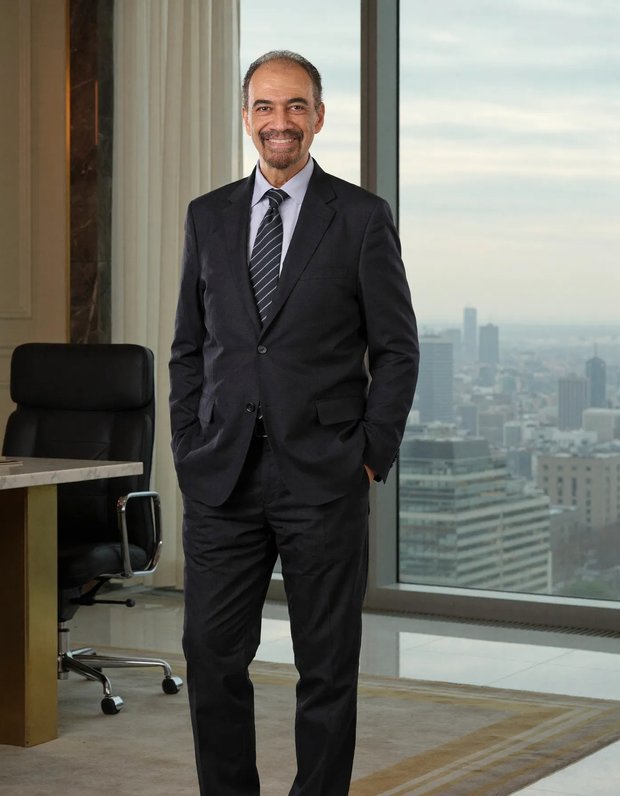 Ayman Samy, founder of The AI SOS, standing in his office