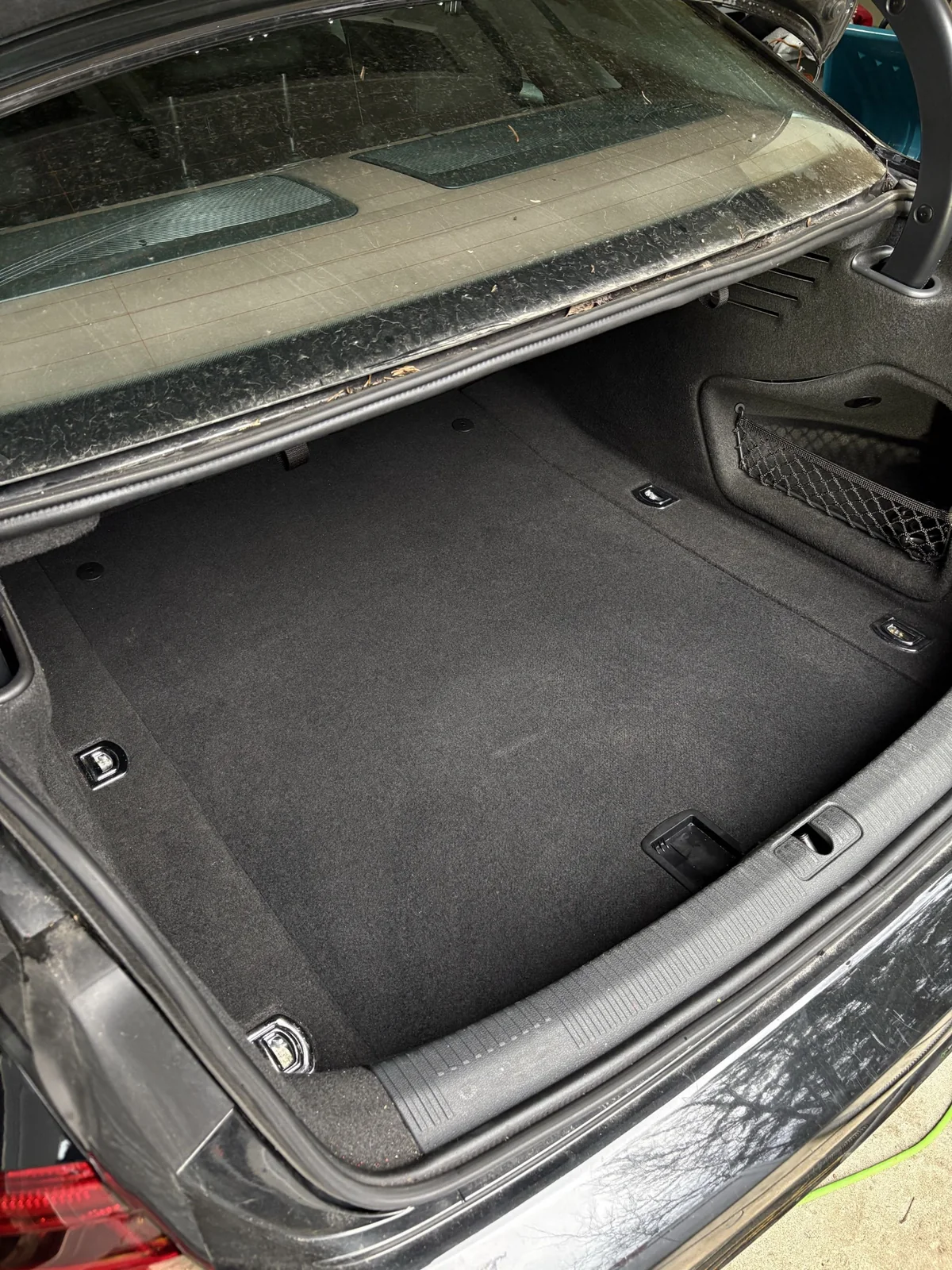 Clean vehicle trunk after interior detailing