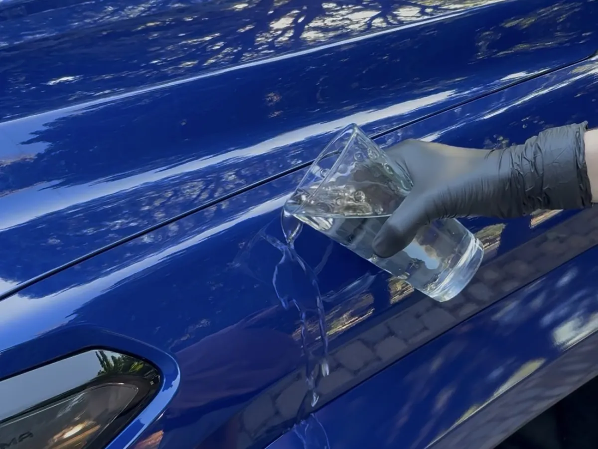 Ceramic coating application on blue vehicle paint