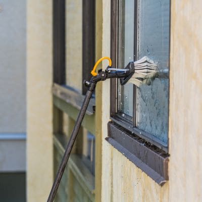 Window cleaning with professional brush