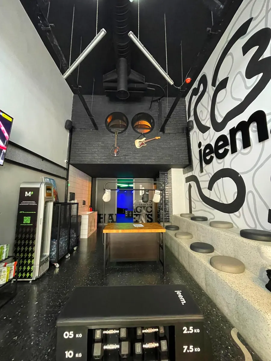 The jeem studio with its stage and guitars on the wall