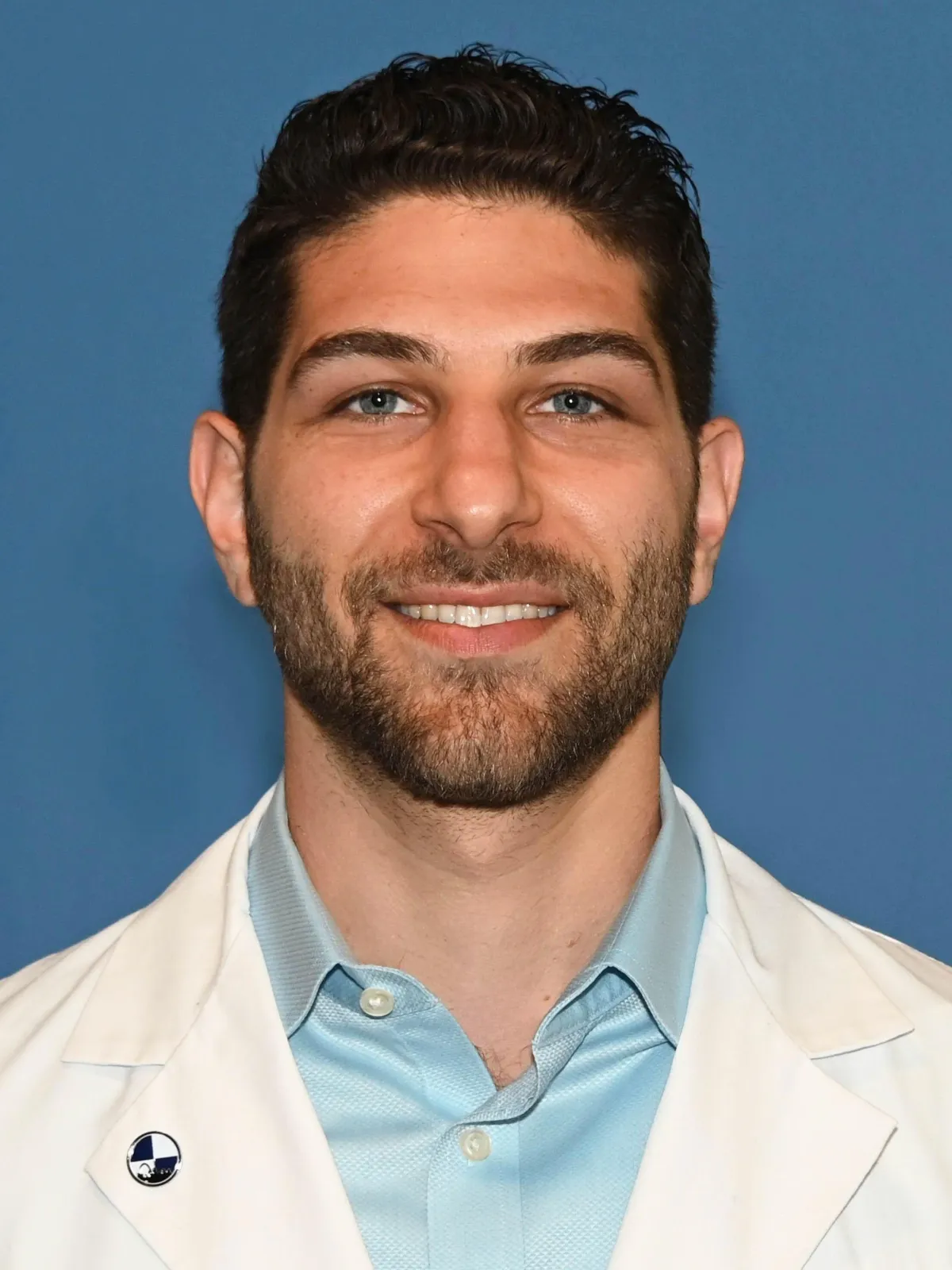Dr. Austin Pollack, sports chiropractor and founder of For Health Chiropractic in Warminster, PA