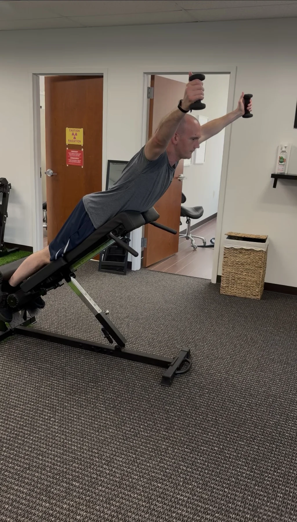 Dr. Austin Pollack supporting a patient's return to everyday movement and activity at For Health Chiropractic