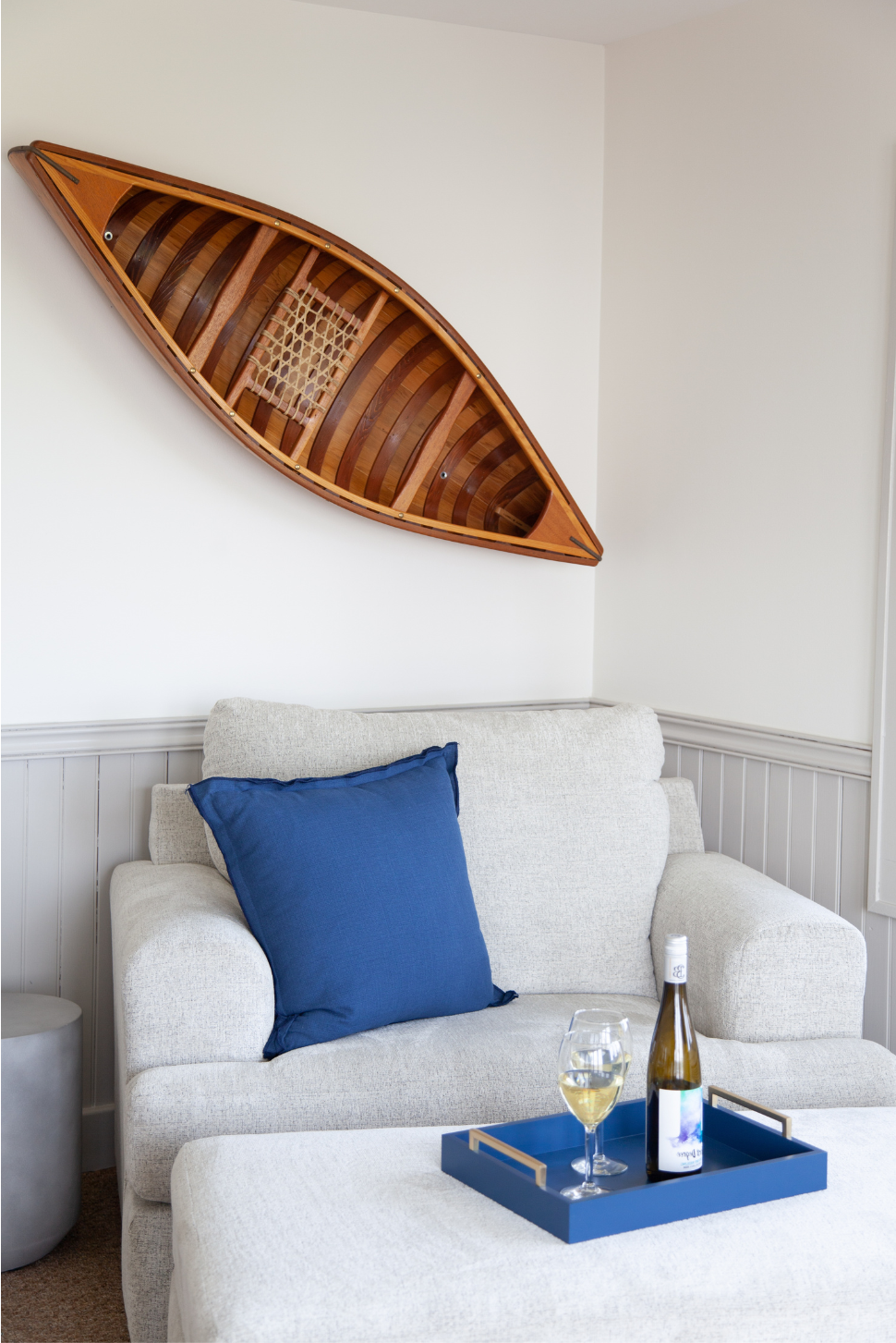 woman setting sheets on bed