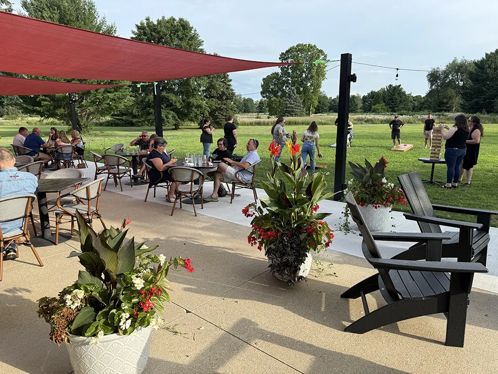 Patio with lawn games and people