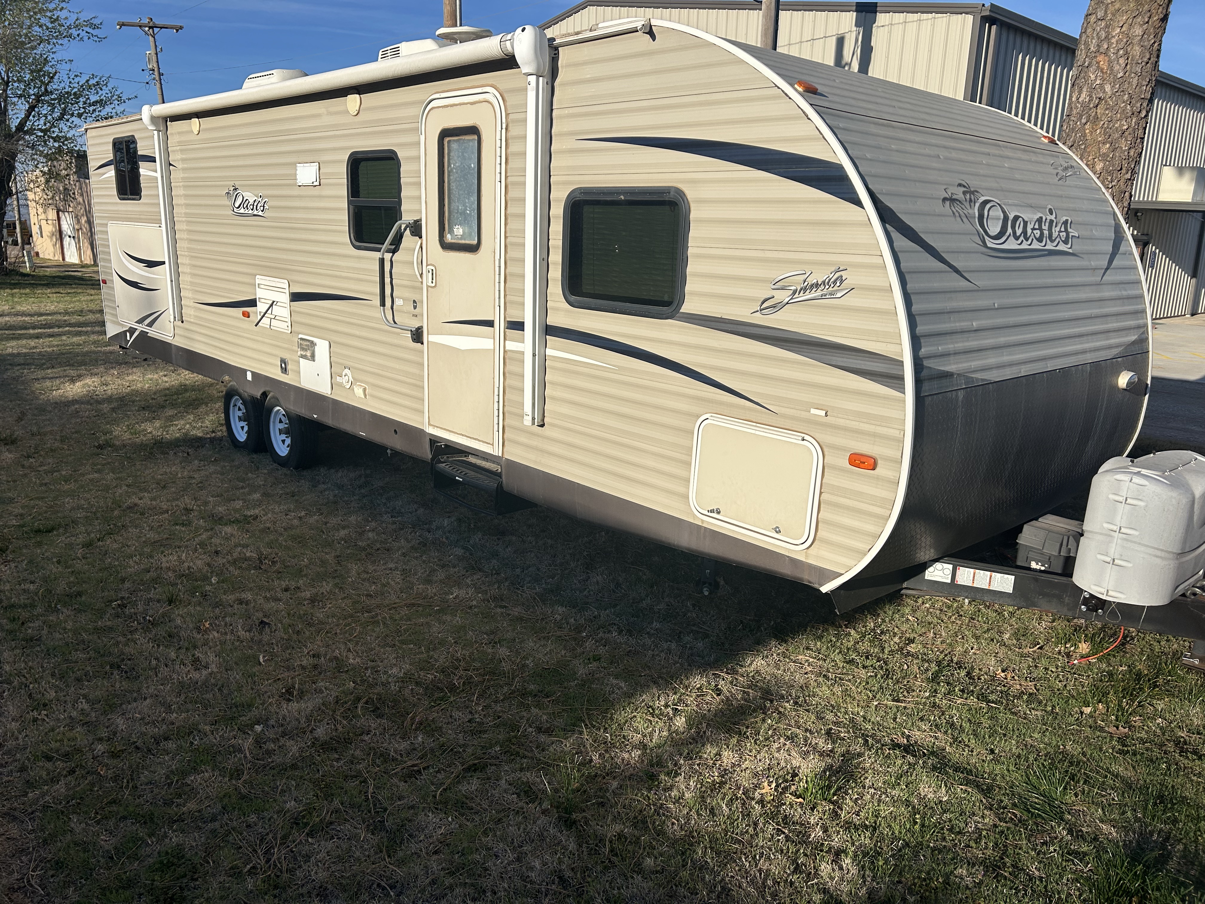 2018 Sasta Oasis travel trailer camper rental with bunkhouse and awning at Decker Rentals & Services in Wichita, KS