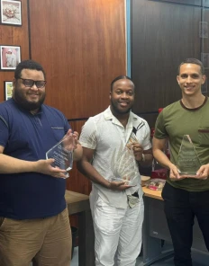Jearel, Jacquelin and Alan at their five-year recognitions at QIS