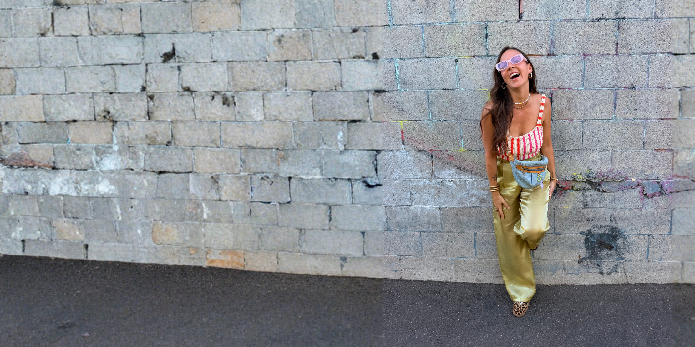 Morgan laughing against a stone wall