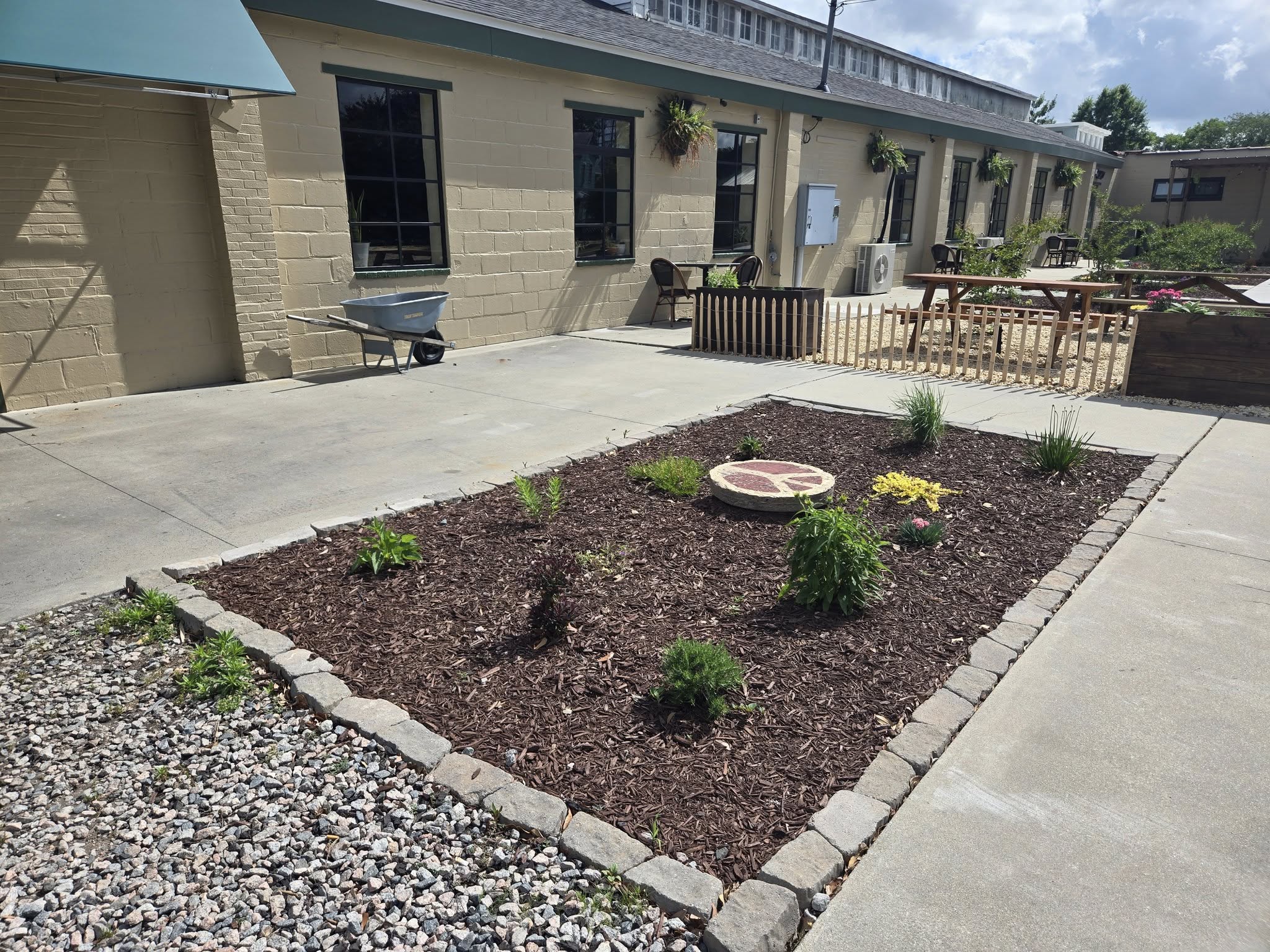 mulched garden bed organic soil health low maintenance landscaping NC