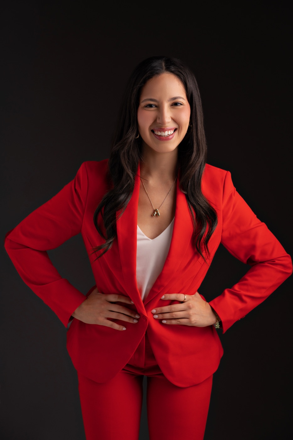 Ambar in orange blazer