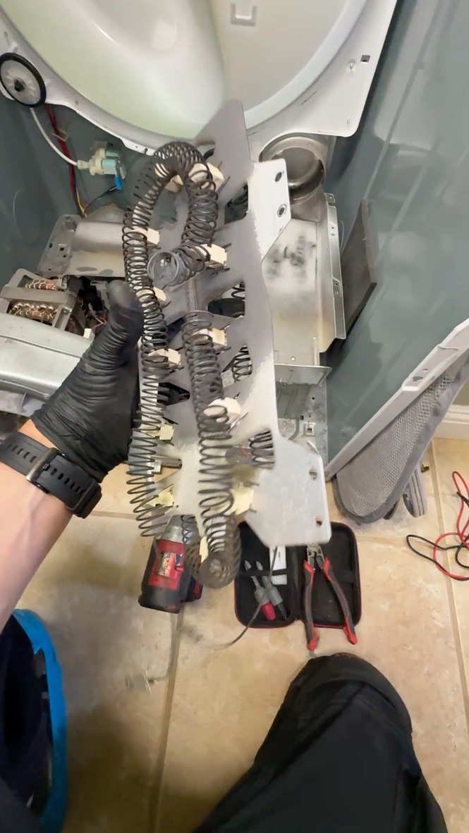 Failed Samsung dryer heating element removed during repair in Winters, California Failed Samsung dryer heating element removed during repair in Winters, California