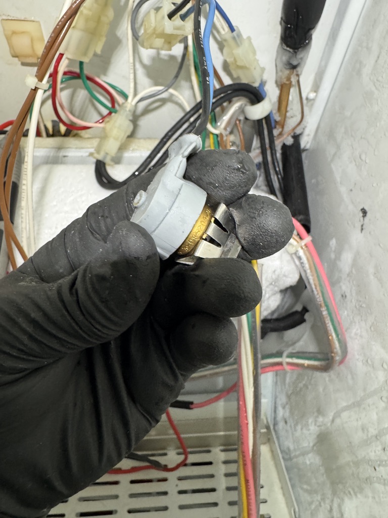 Defrost thermostat handled during a Sub-Zero freezer repair in Citrus Heights