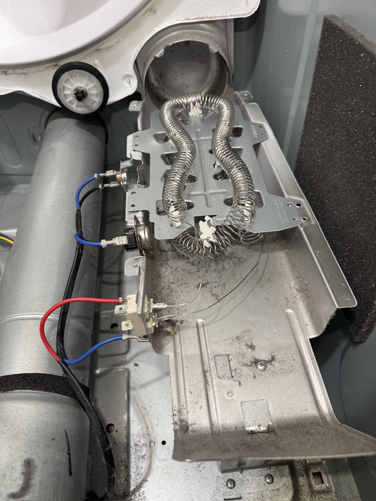 Replacement heating element fitted in the Samsung dryer heater housing