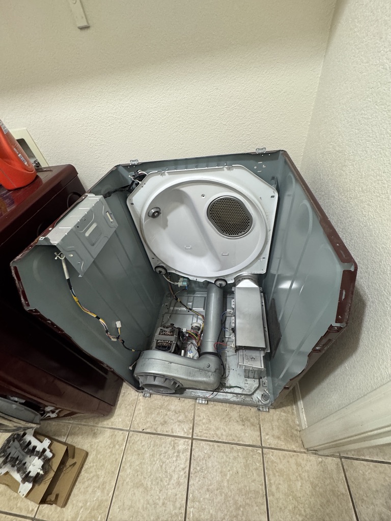 Samsung dryer cabinet interior after vacuum cleaning during heater replacement in Fairfield