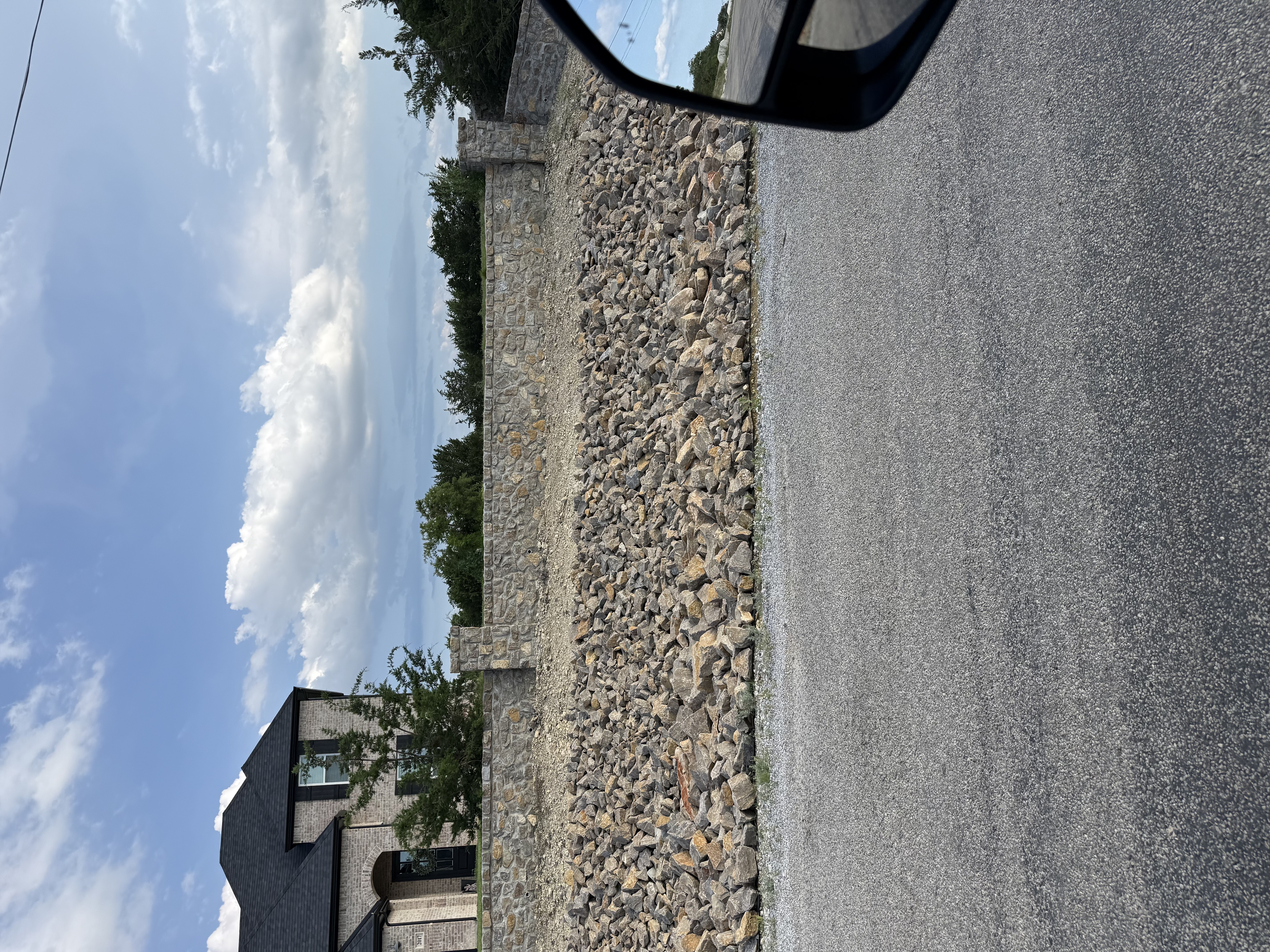 French drain installation in a residential yard in Weatherford, Texas