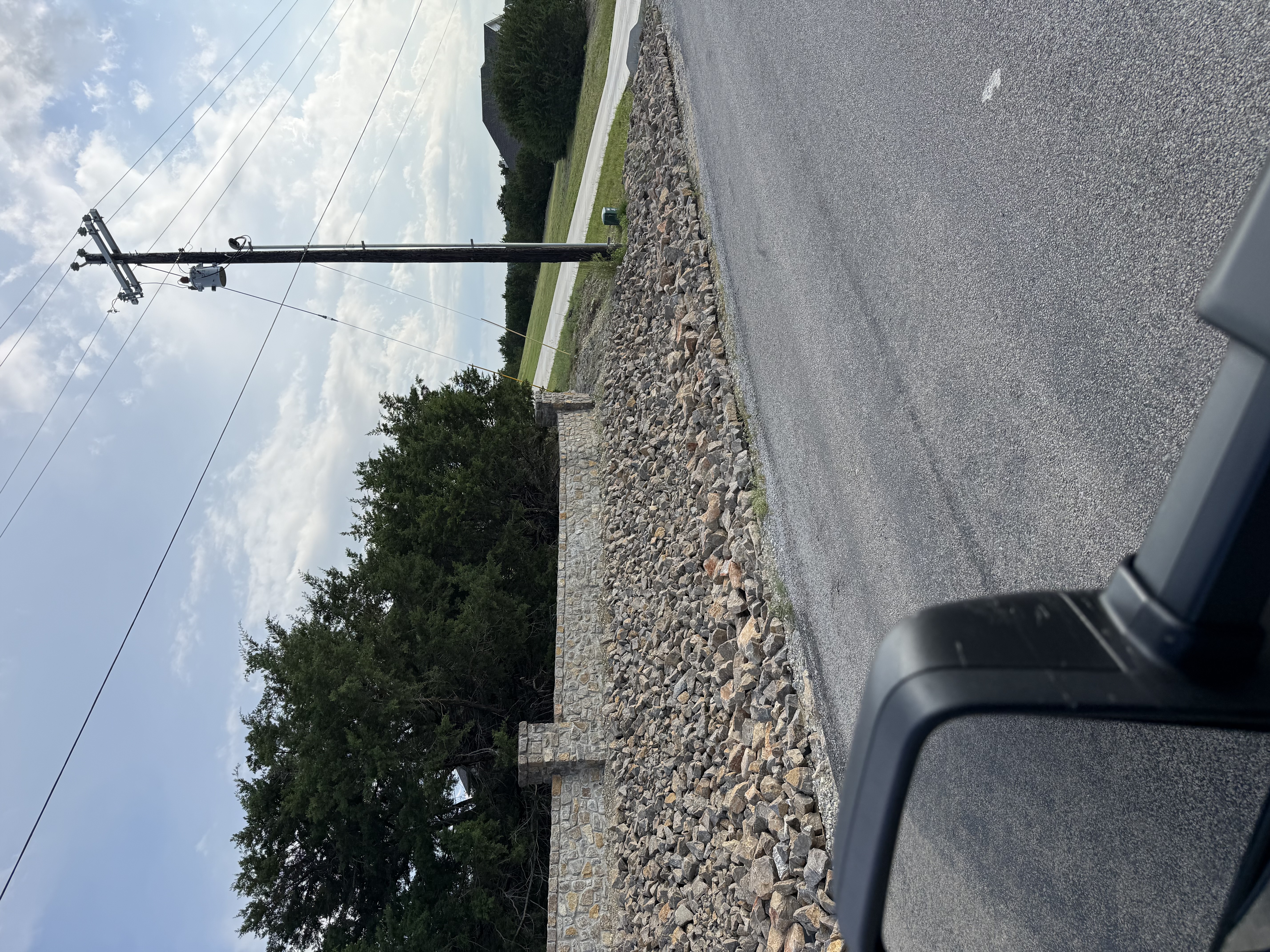 Gravel driveway installation on a ranch property in North Texas