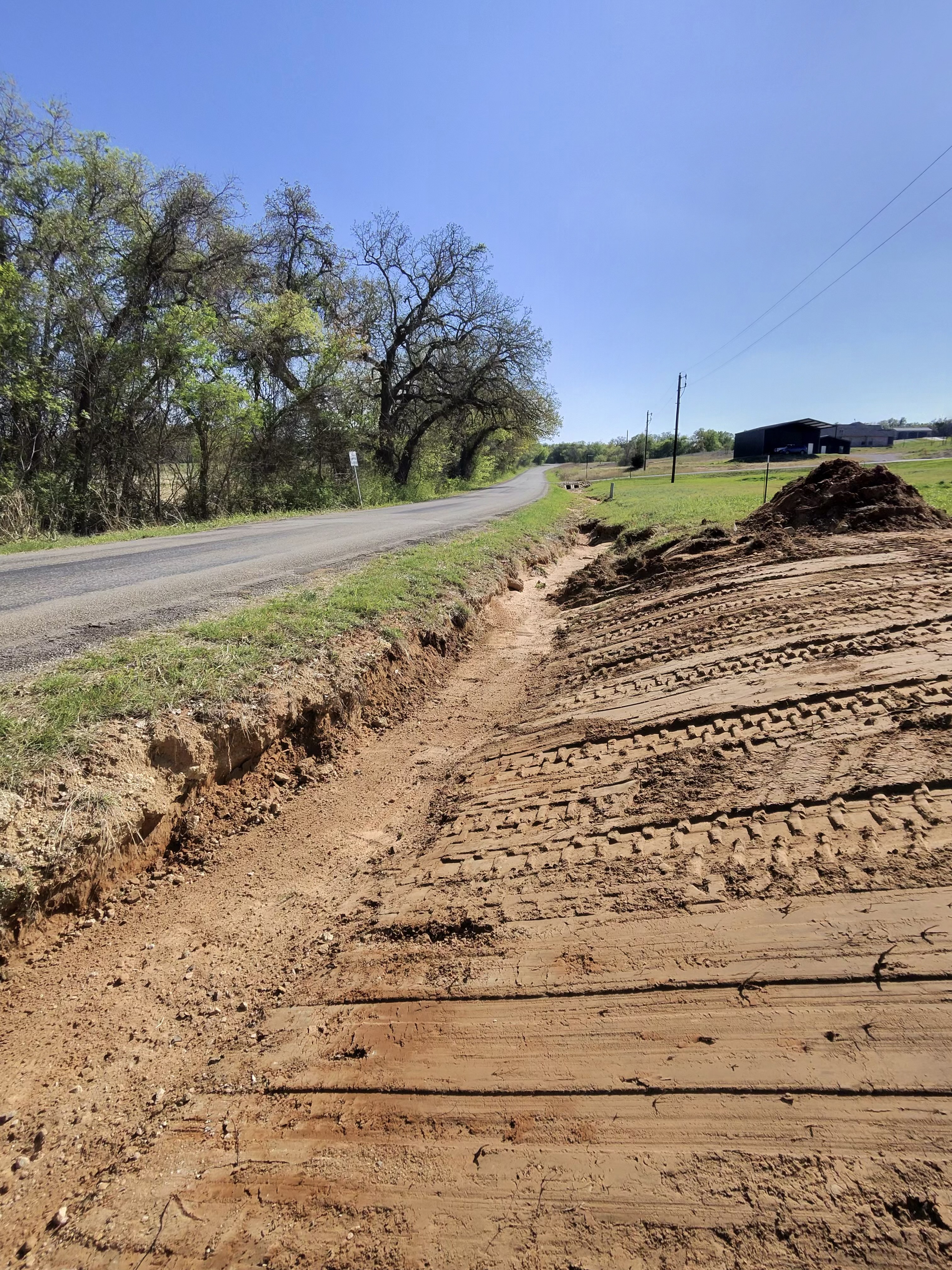 Utility trenching work on a Texas property for underground lines