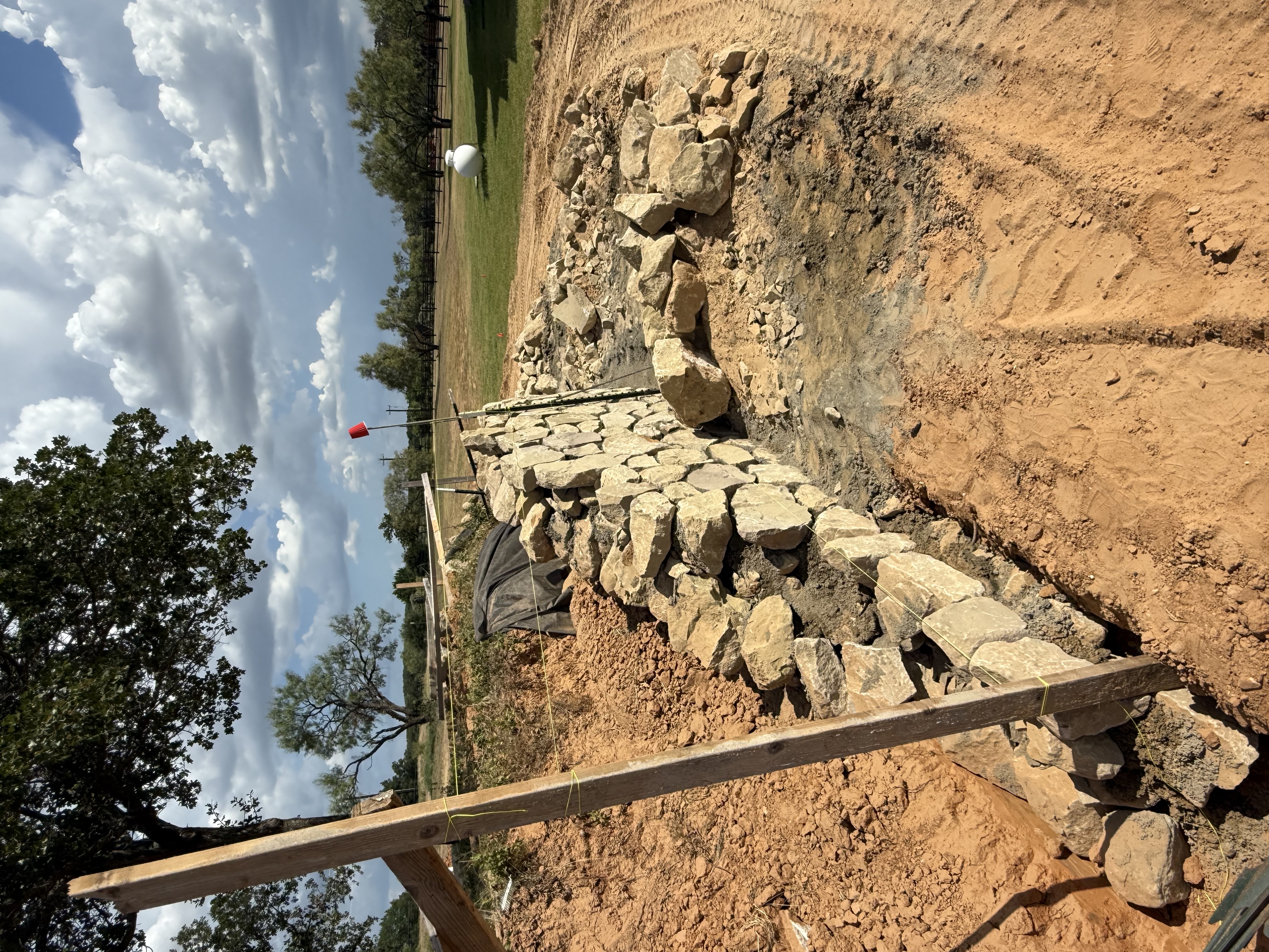 Heavy excavation equipment digging on a rural Texas property