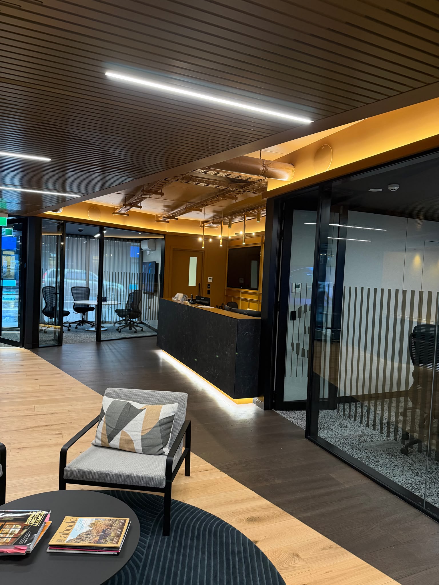 Hierarchy project management office interior with spray-finished ceilings, ducting and joinery