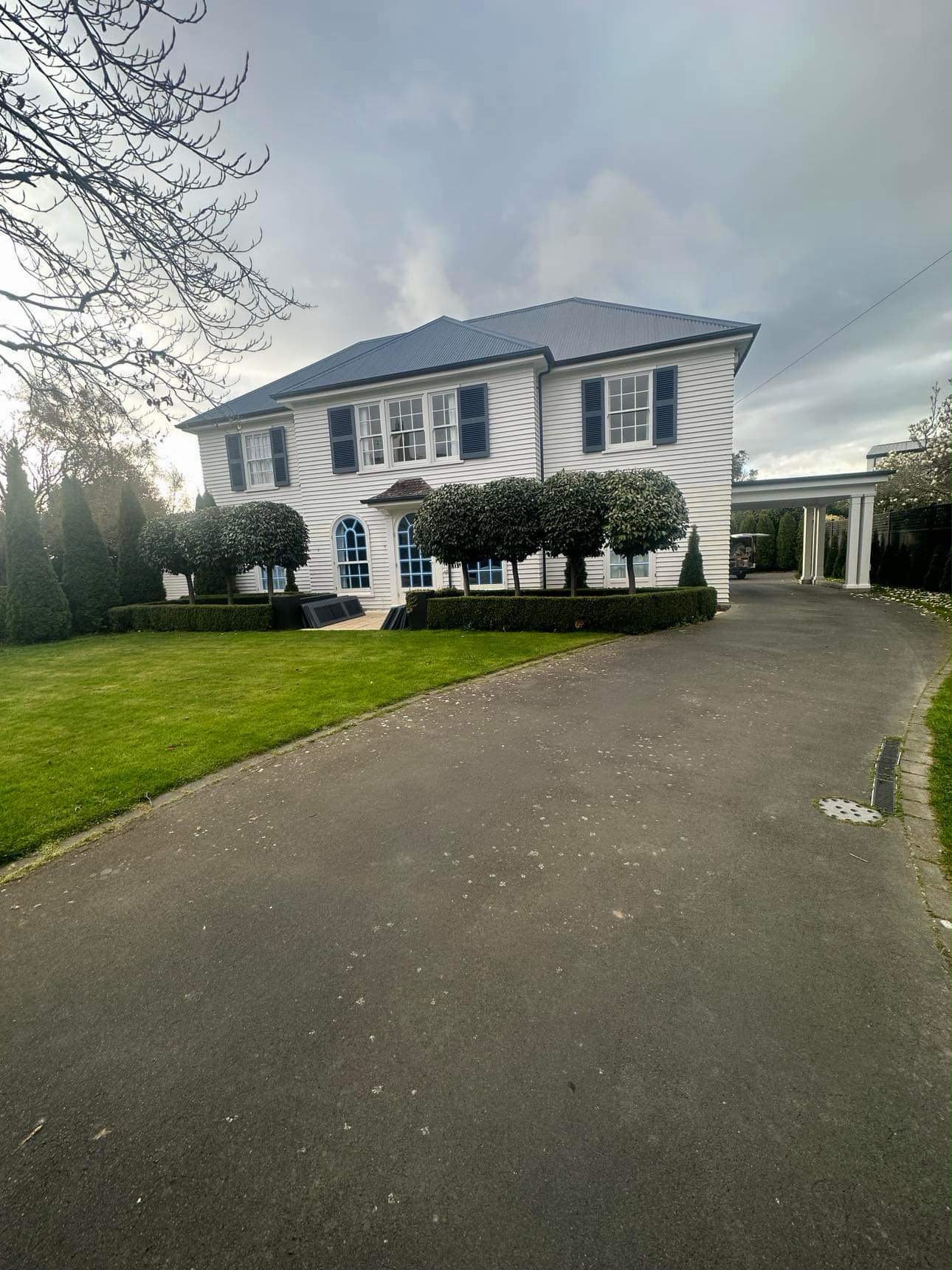 Exterior painting project with a refreshed street-facing finish