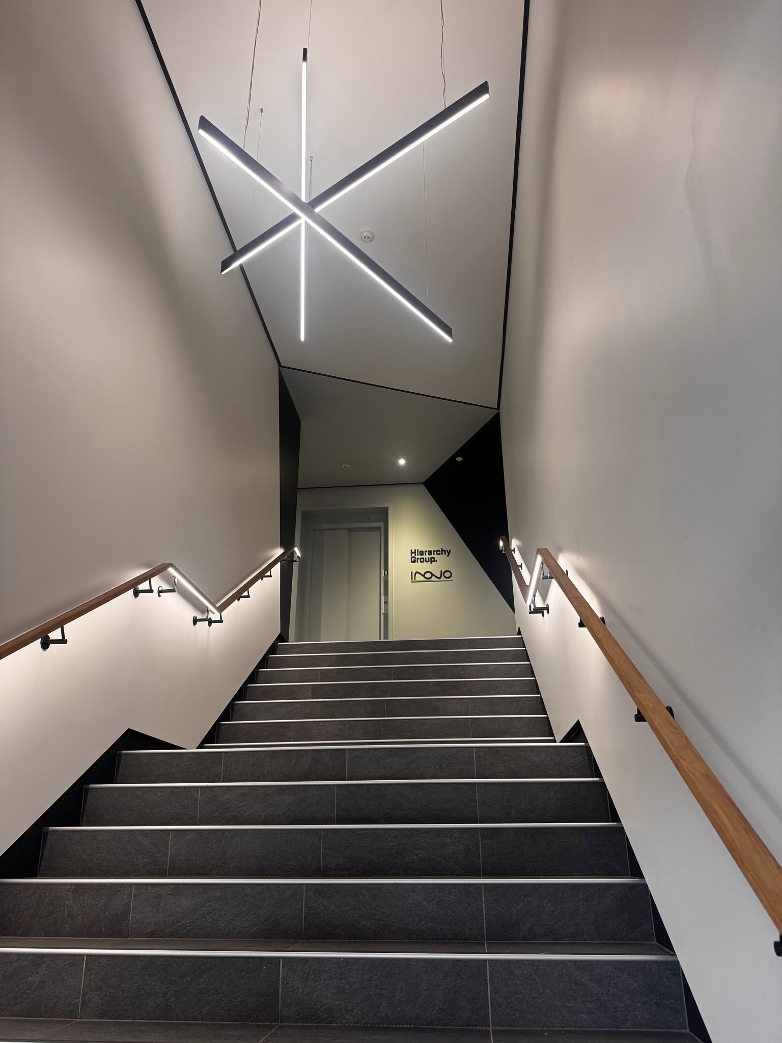 Sprayed fitout joinery detail showing clean finish across mixed materials