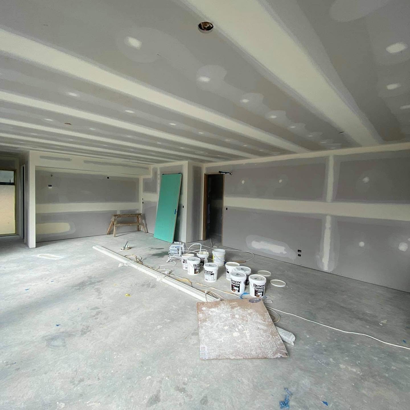 Interior gib-stopping and plaster preparation underway