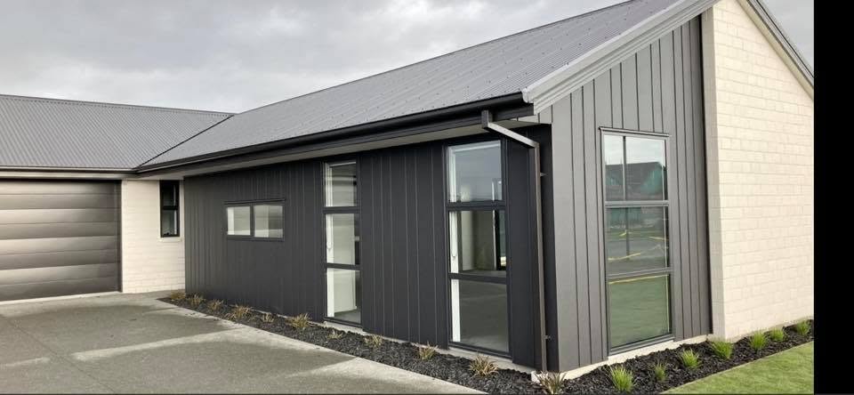 Exterior preparation and painting detail on a Christchurch home