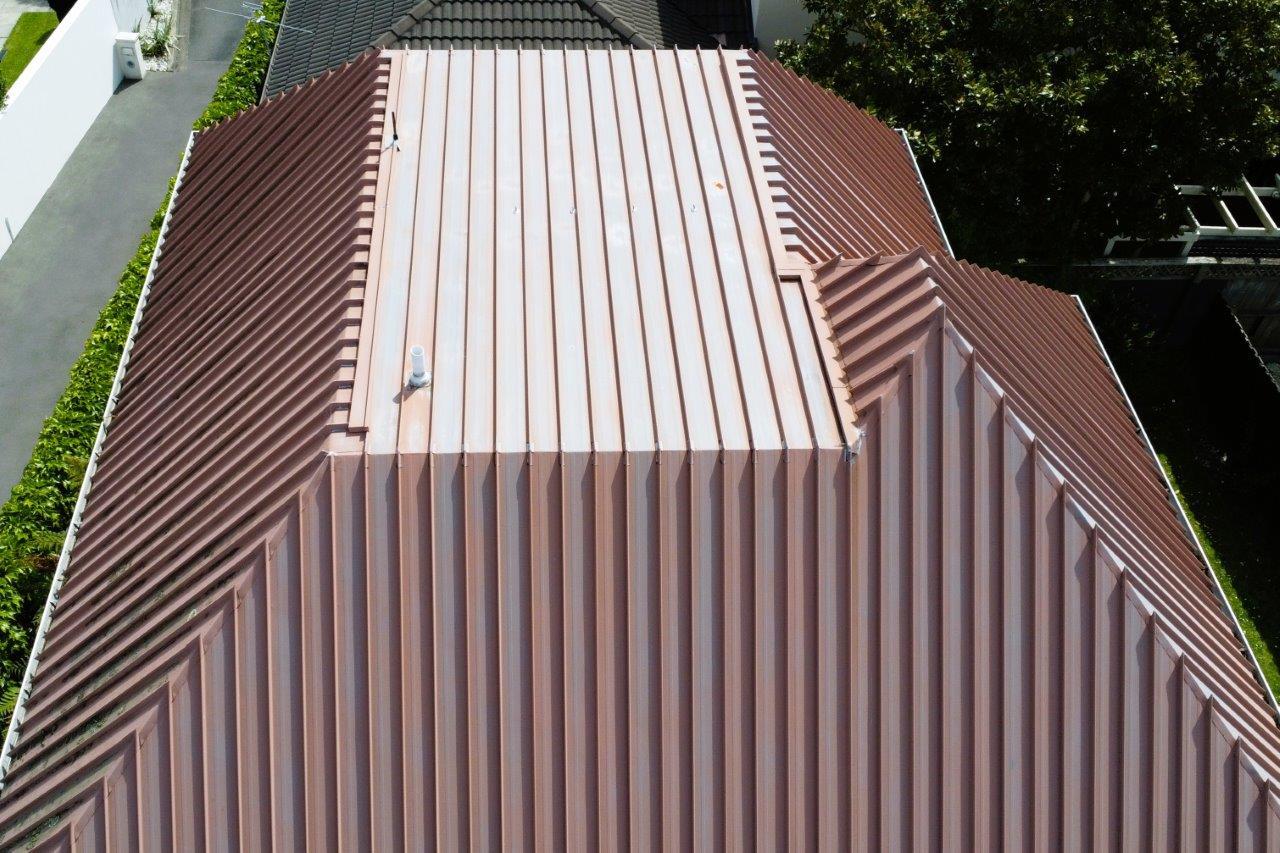 Close-up of corrugated iron roof profile and coating detail