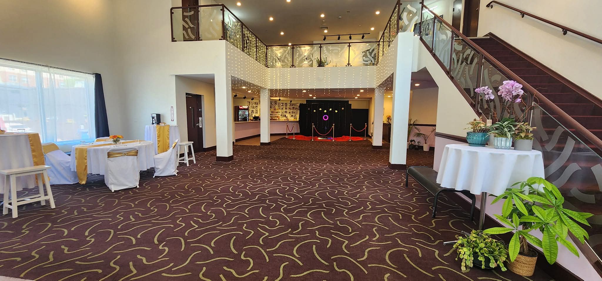 Grand lobby with staircase and event setup