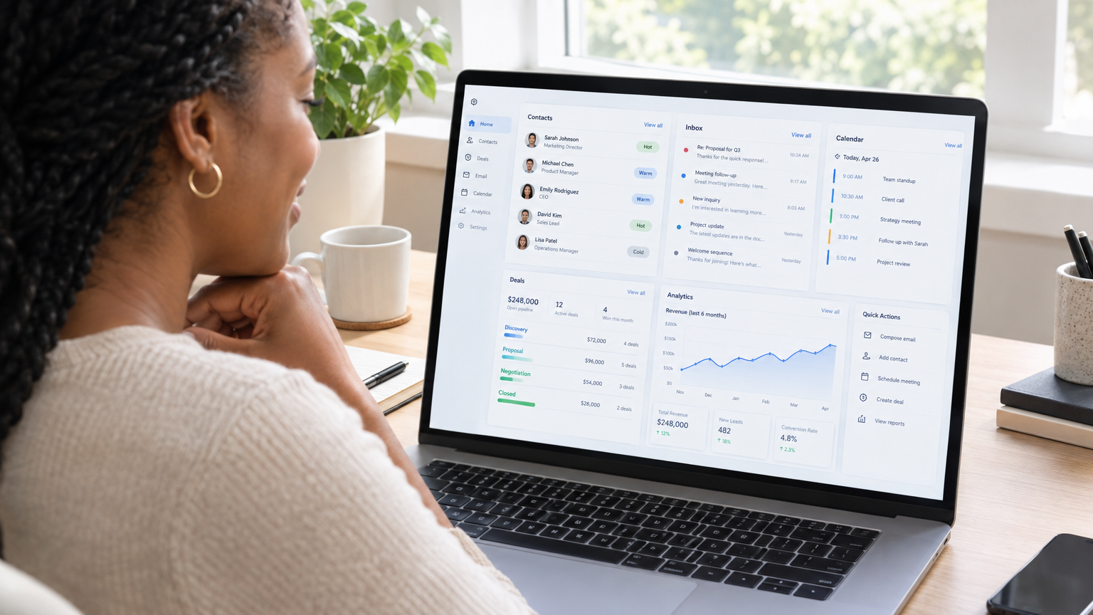 A small business owner reviewing a unified analytics dashboard showing all marketing and sales data in one place
