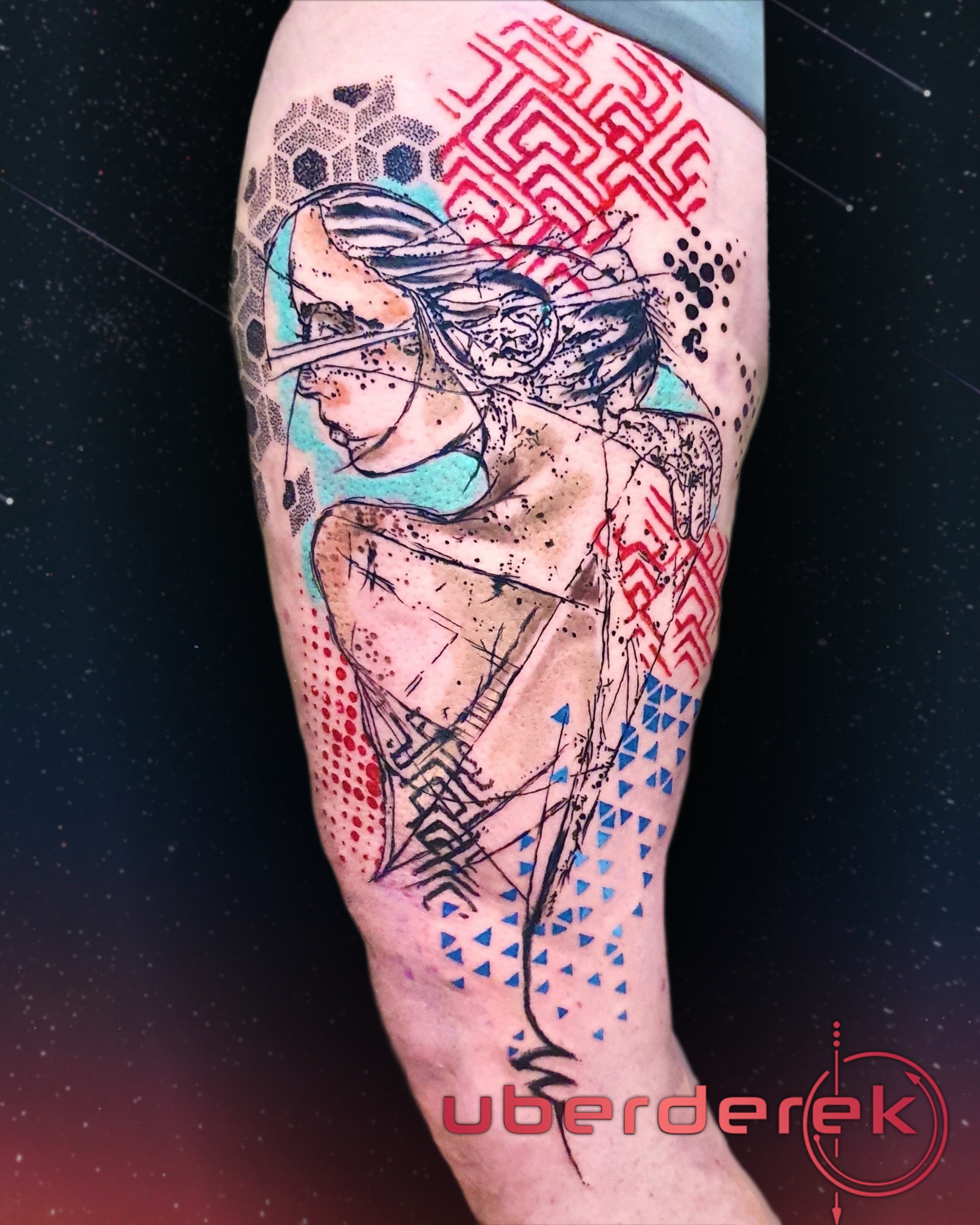 Abstract graffiti-style thigh tattoo with geometric background, original artwork by UberDerek