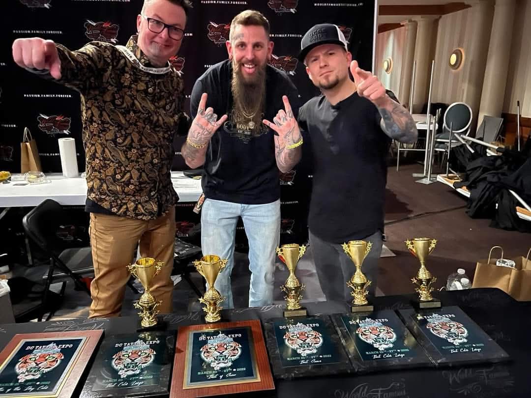 Derek Entenmann with multiple awards at the DC Tattoo Expo