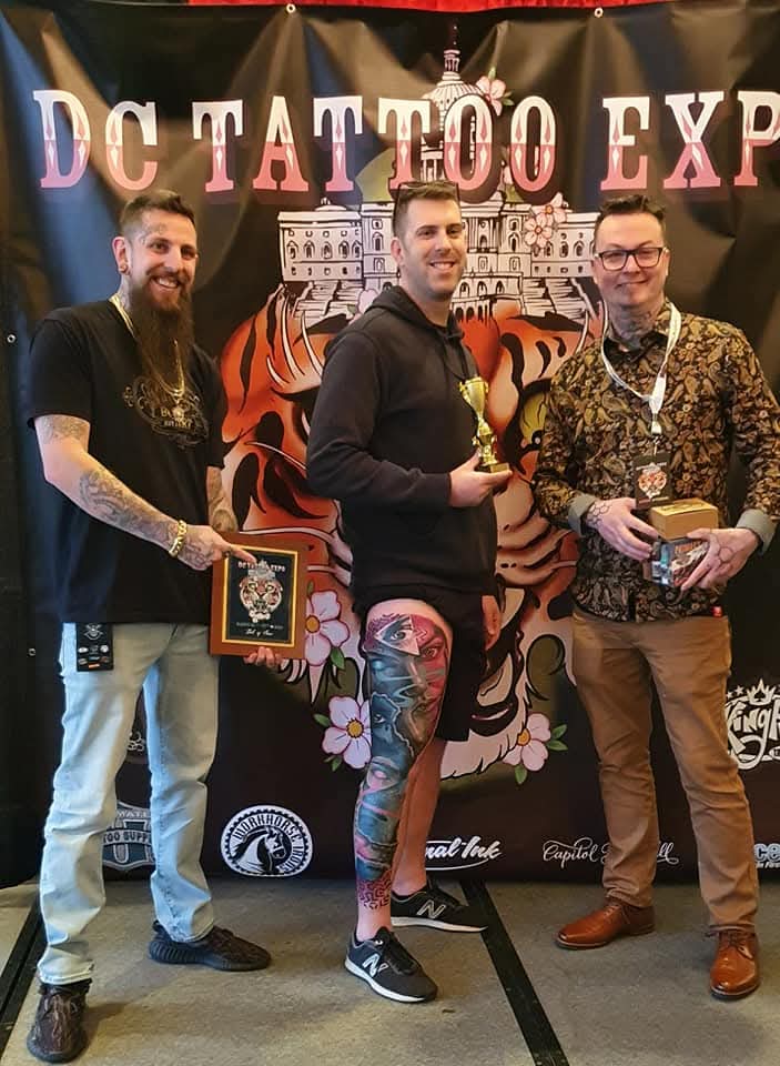 Derek Entenmann winning Best of Show at the DC Tattoo Expo