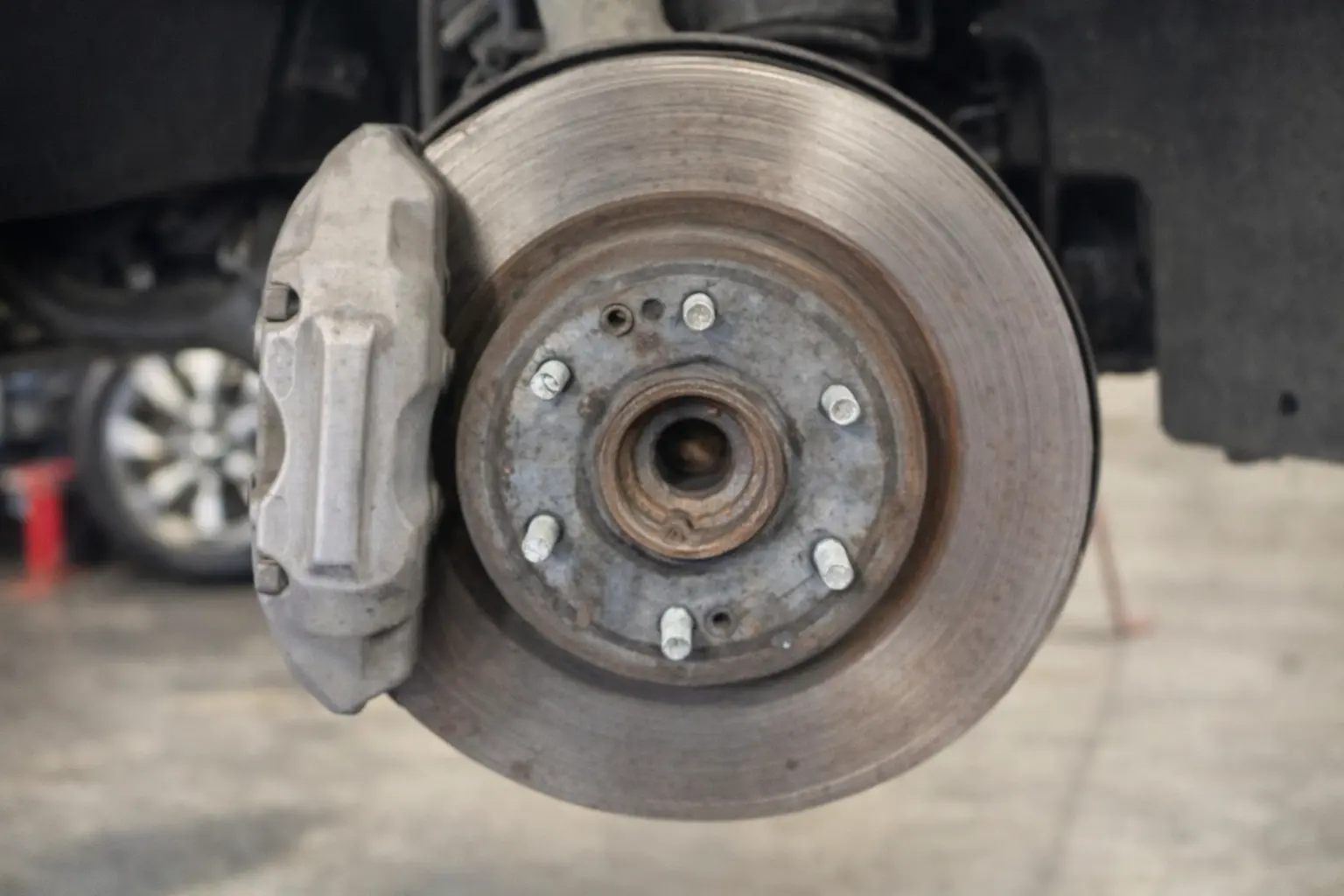 Worn brake pads before replacement