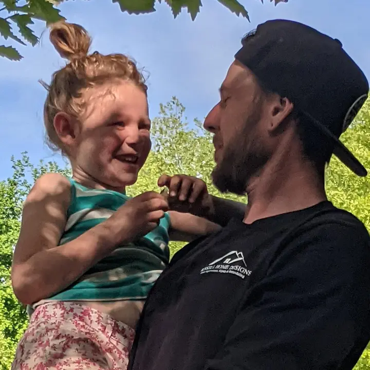 Ben Kissell and his daughter outdoors