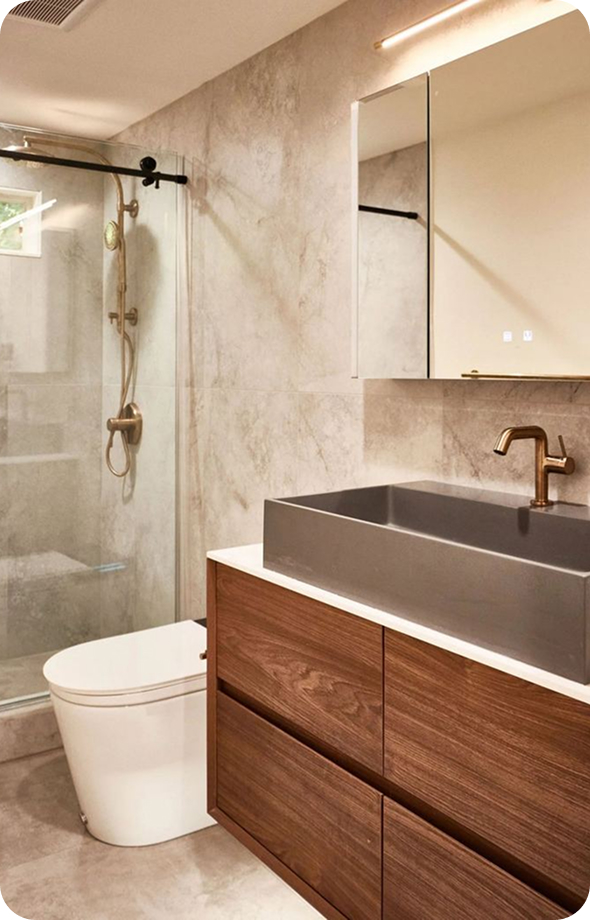 Remodeled bathroom with vanity and glass shower