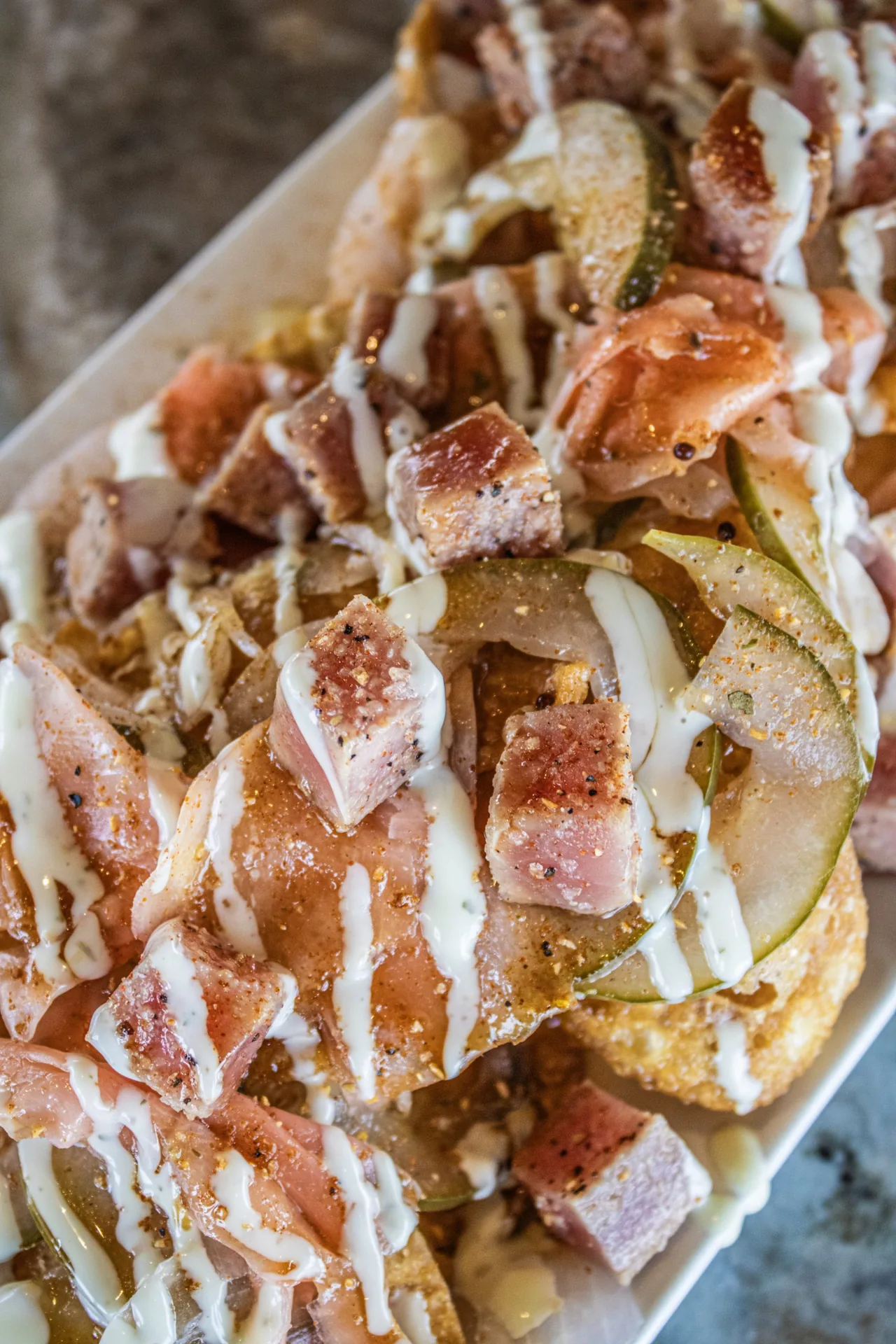 Seared tuna nachos plate
