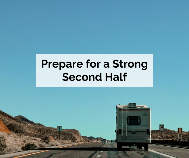 Prepare for a strong second half - rv on road approaching top of small hill
