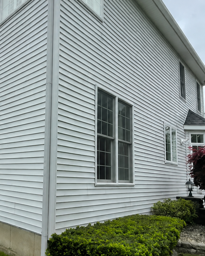 Exterior surface after professional cleaning by Thin Red Line Pressure Washing in Clifton Park, NY.