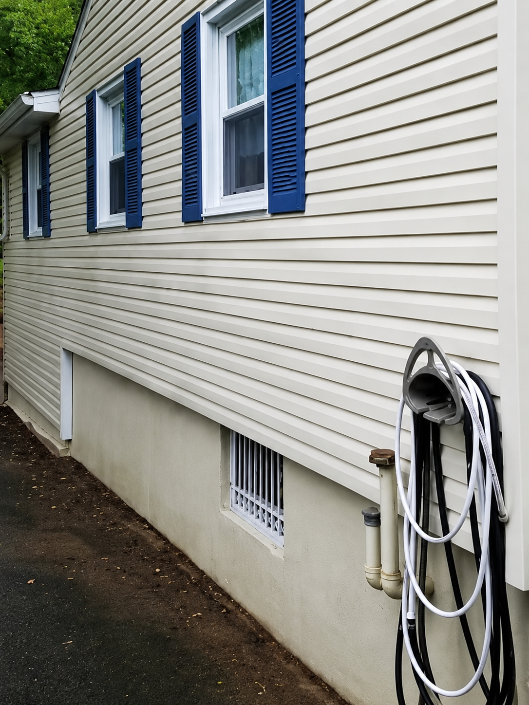 Exterior surface after professional cleaning by Thin Red Line Pressure Washing in Clifton Park, NY.