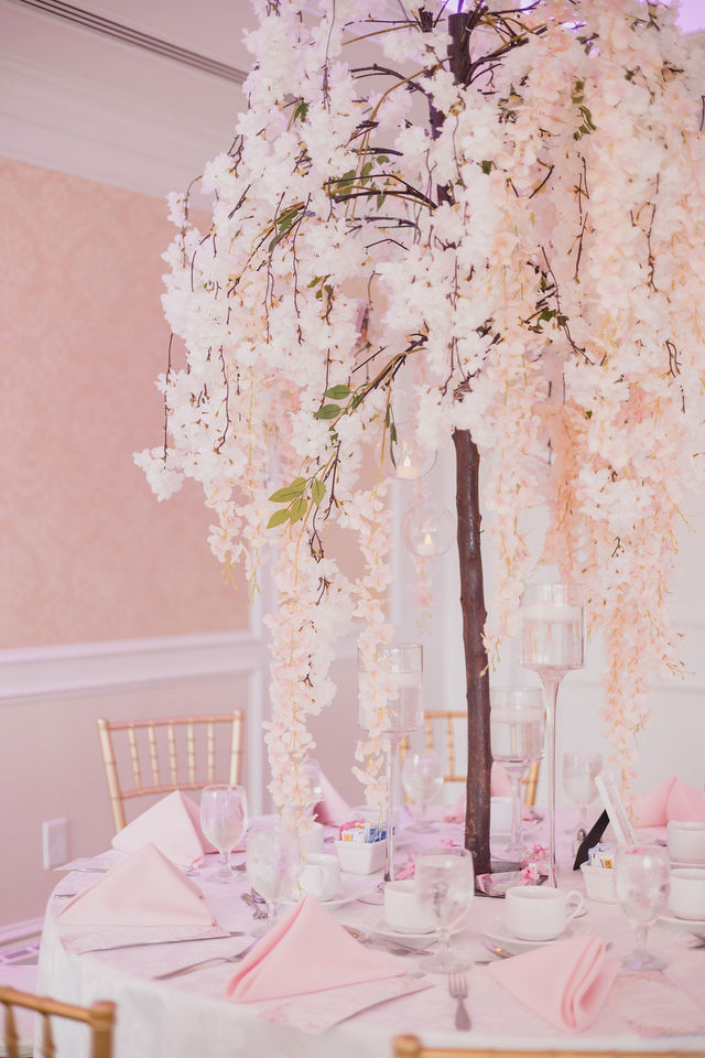 Pink and white cherry blossom centerpiece on a round table by MJ Event Designs