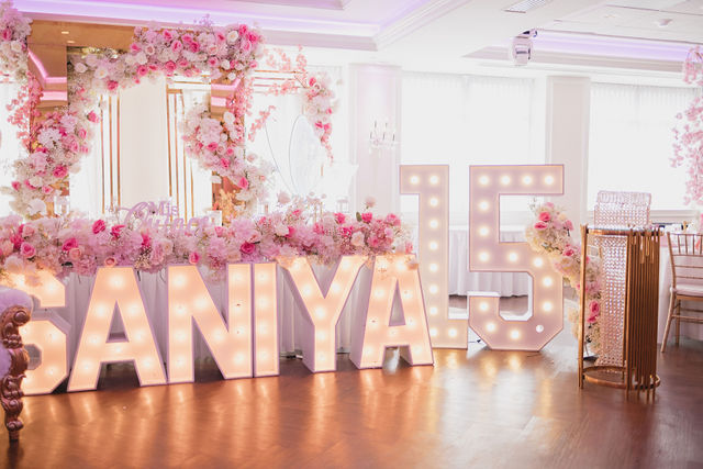 Illuminated marquee letters with pink rose and peony florals by MJ Event Designs