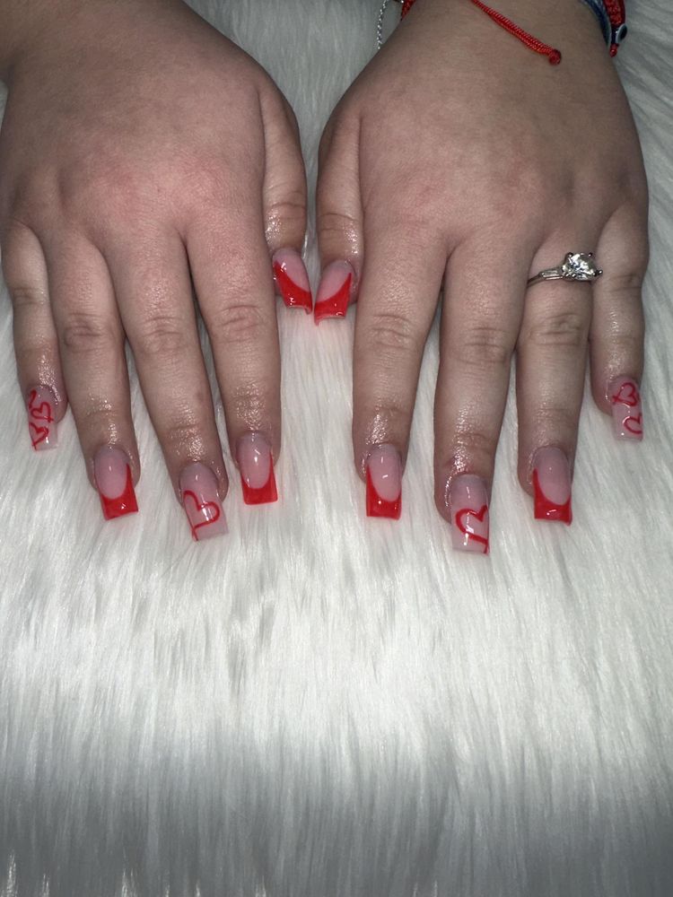 Square nails with red French tips and red line-art hearts