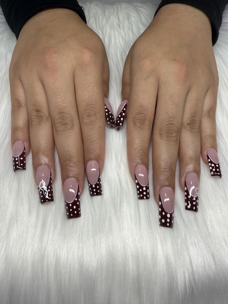 Burgundy polka dot French nails with pink bows