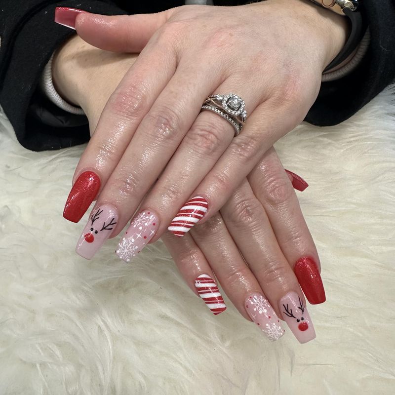 Coffin nails with reindeer, snowflakes, candy canes and red glitter