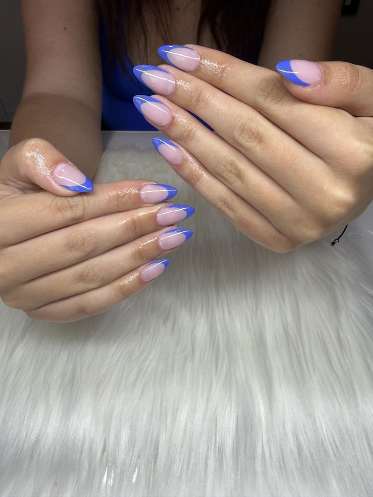 Almond nails with cobalt blue French tips
