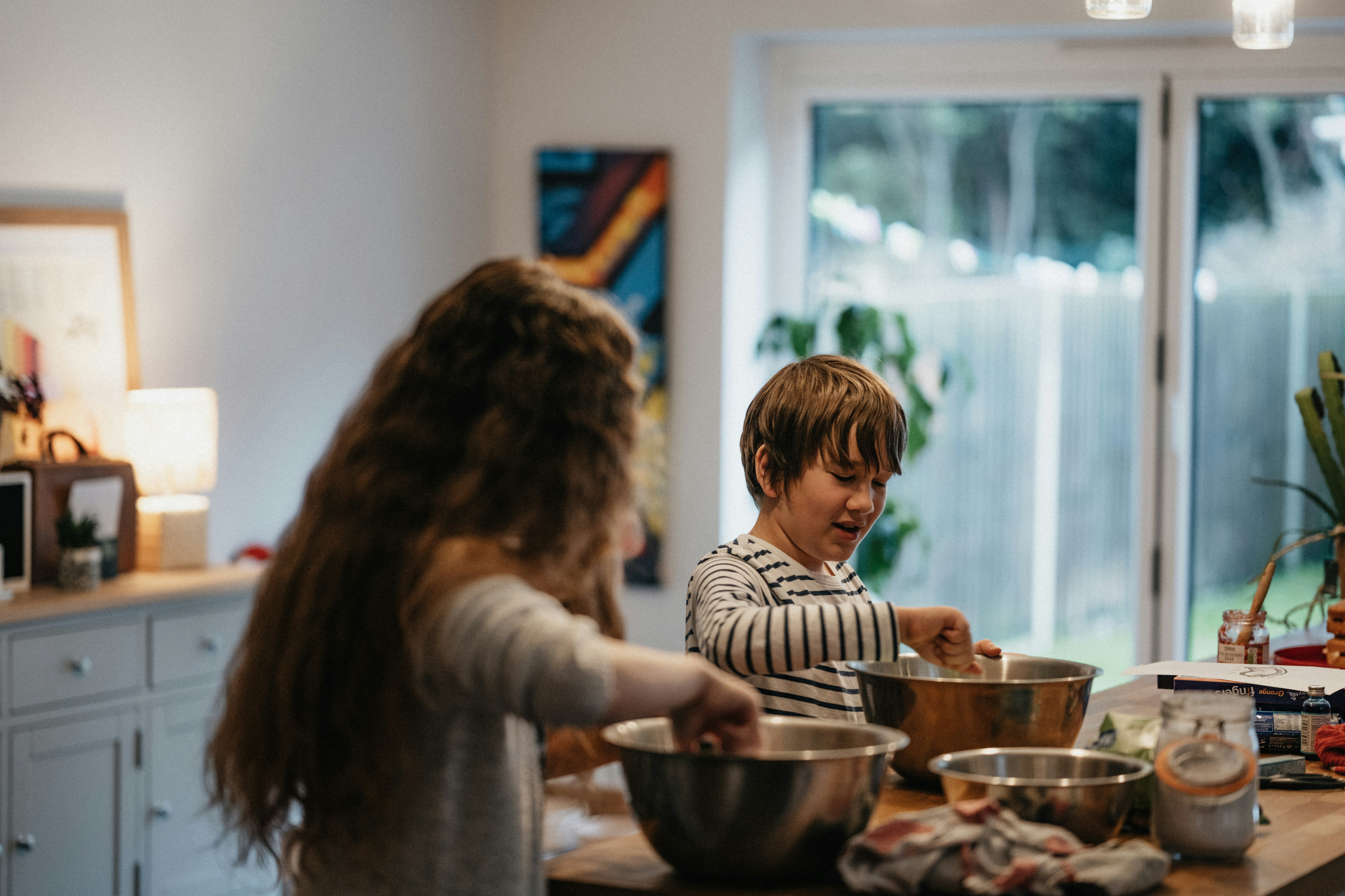 children cooking together in the kitchen