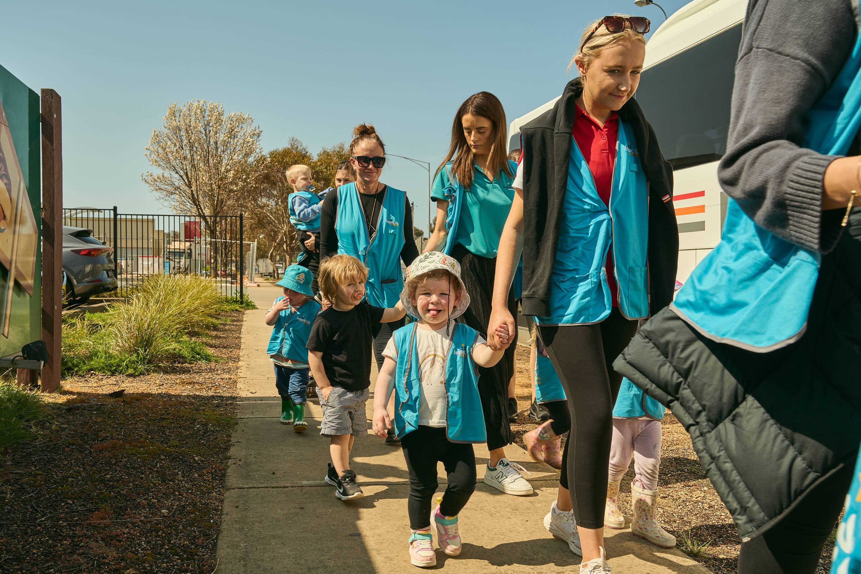 children being guided by educators