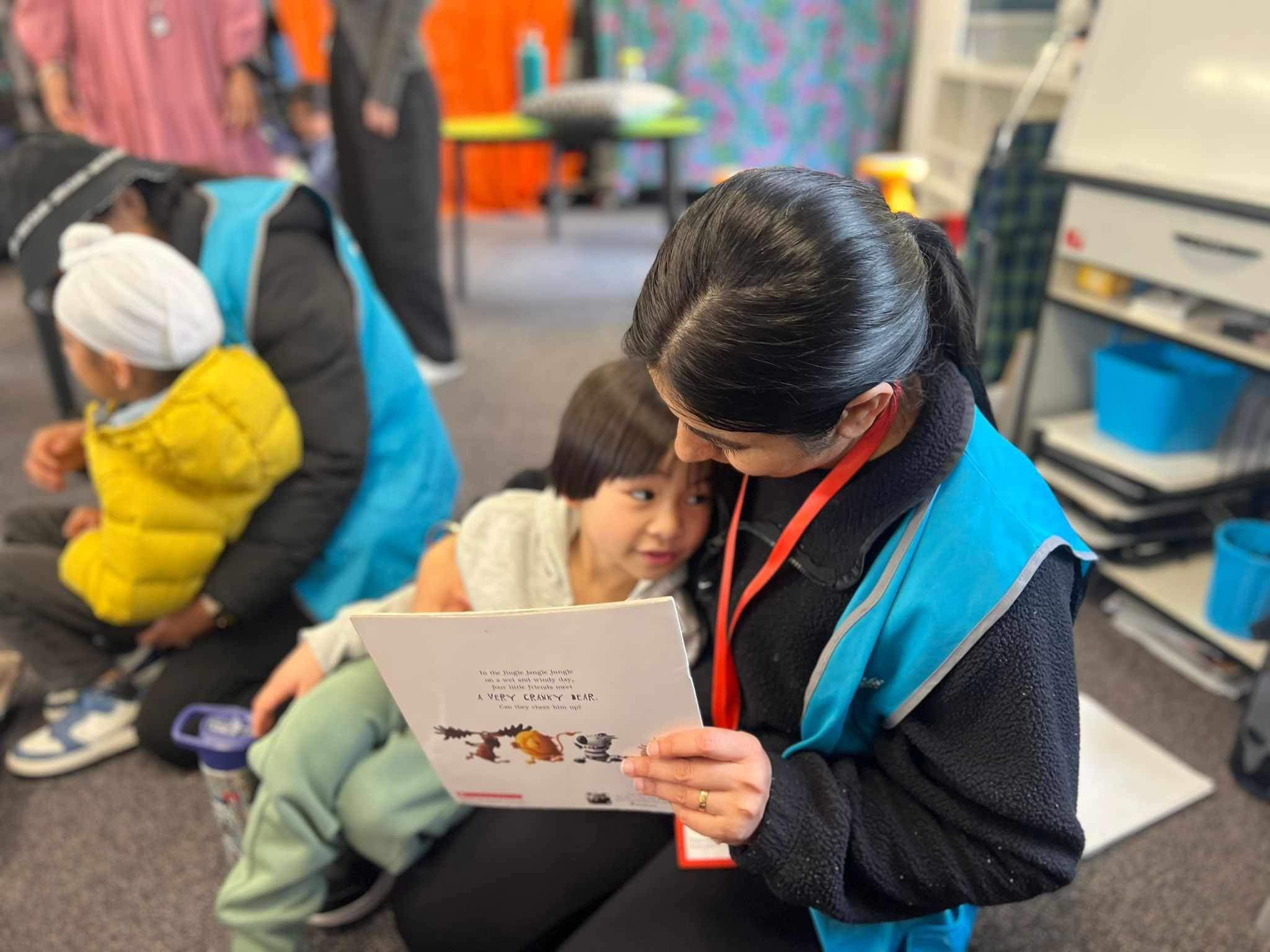 children leaning to adults