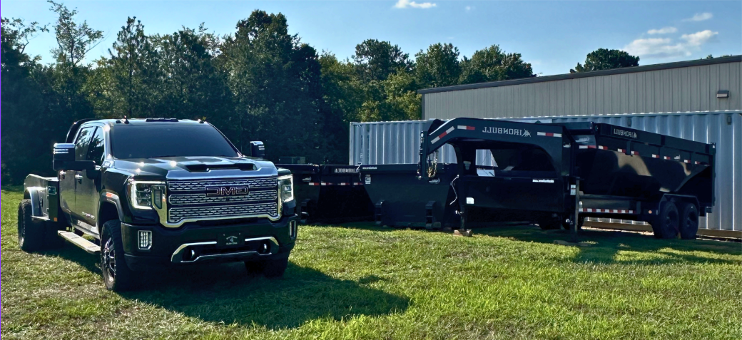 Rollback truck and dumpster